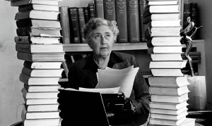 Agatha Christie, surrounded by some of her 80-plus crime novels.